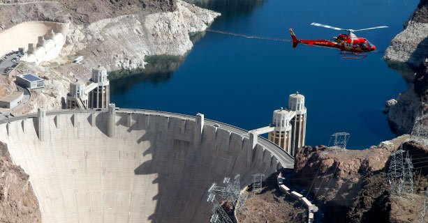 A helicopter tour in flight over Hoover Dam.