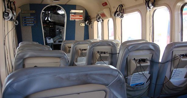 The interior cabin of a Twin Otter airplane.