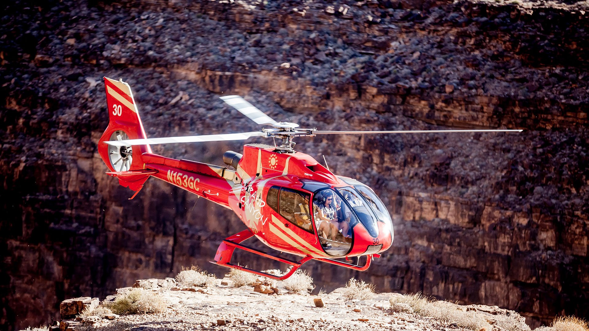 EC-130 helicopter flying through the Grand Canyon West Rim.