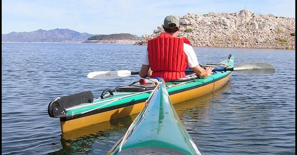 A kayaker exploring the Colorado River.