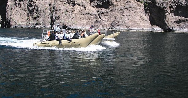 Passengers on a raft exploring the Colorado River.