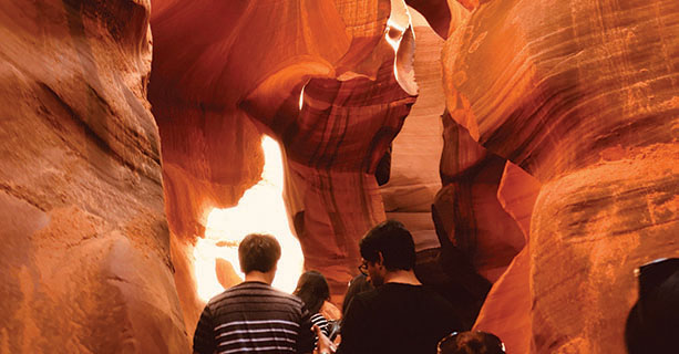 Tourists explore the interior of Antelope Canyon.