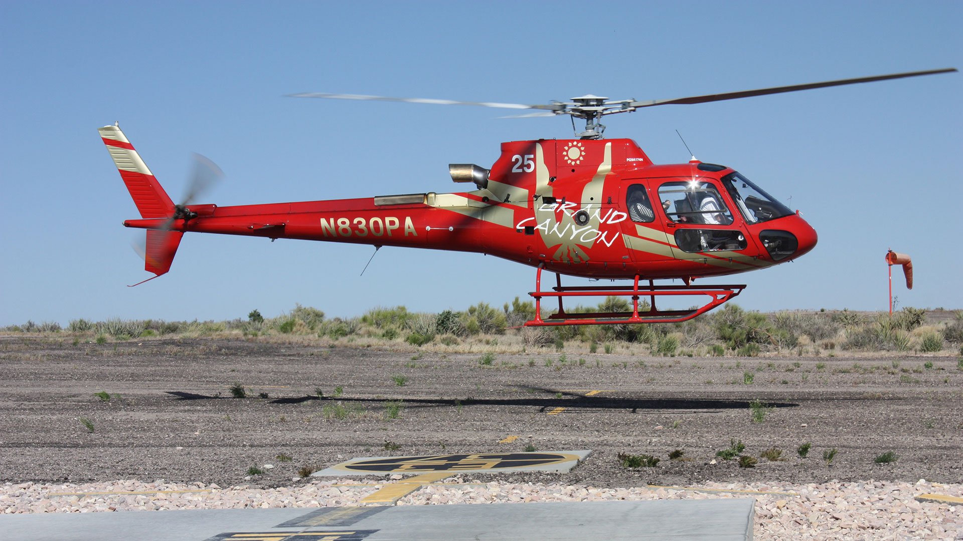 A Bell helicopter sets off on a tour.