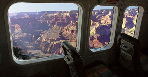 A Grand Canyon view from the window of an airplane tour.