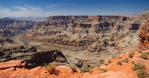 A panoramic view of the Grand Canyon and Colorado River.