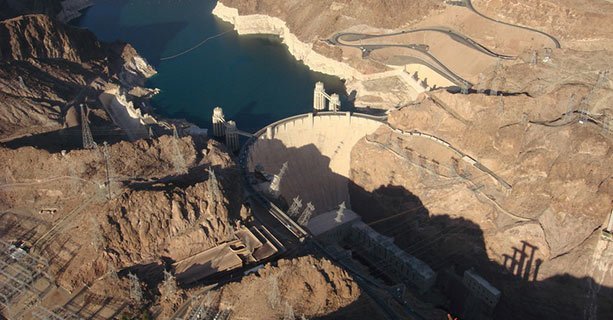 Hoover Dam and the surrounding scenery seen from the sky.