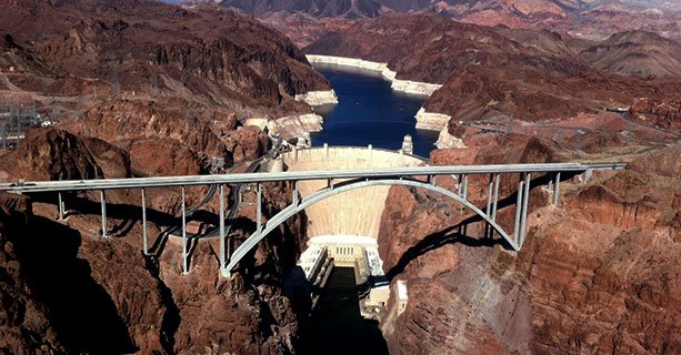 Aerial view of the Hoover Dam and the O'Callaghan-Tillman Memorial Bridge.