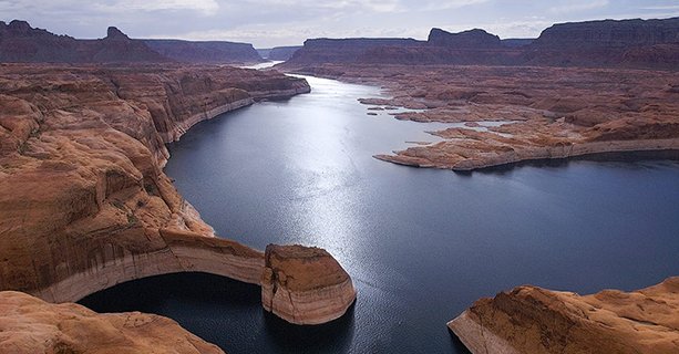 A view of Lake Powell and the surrounding desert scenery from the sky.