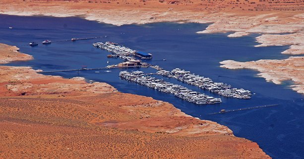 A marina located within Lake Powell, seen from a helicopter.