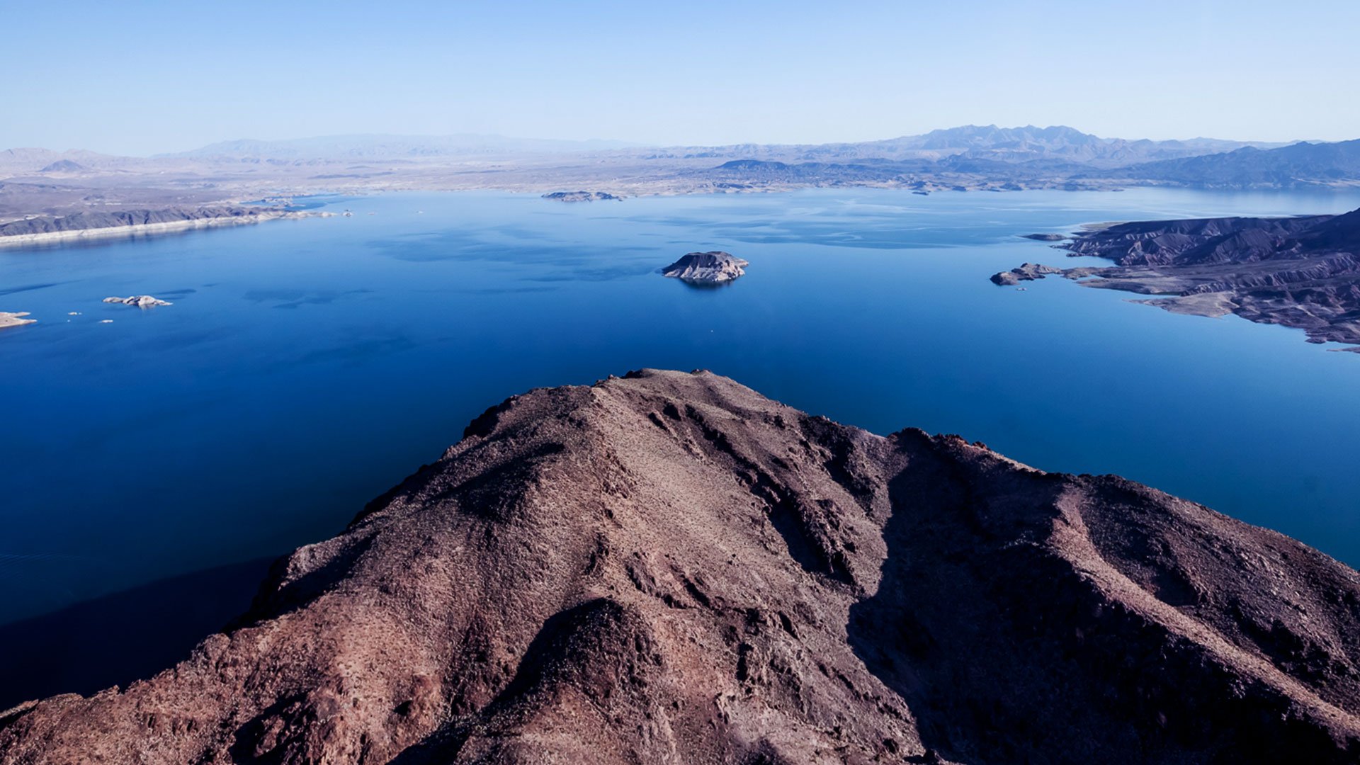 Aerial view of the bright blue waters of Lake Mead.