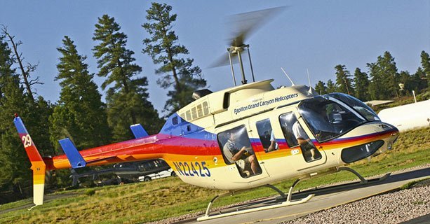 A Bell helicopter landed at the Grand Canyon air terminal.