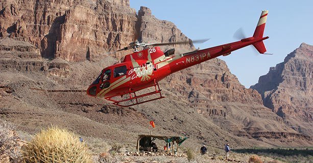 A helicopter making its descent to the bottom of the Grand Canyon West.