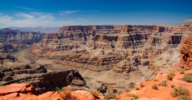 A panoramic view of a scenic Grand Canyon landscape.