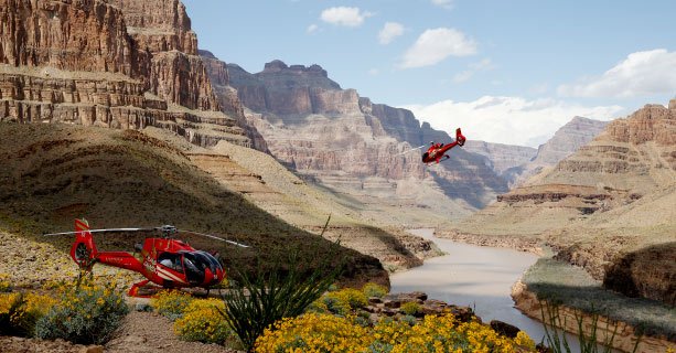 A helicopter lands on the floor of the Grand Canyon West.