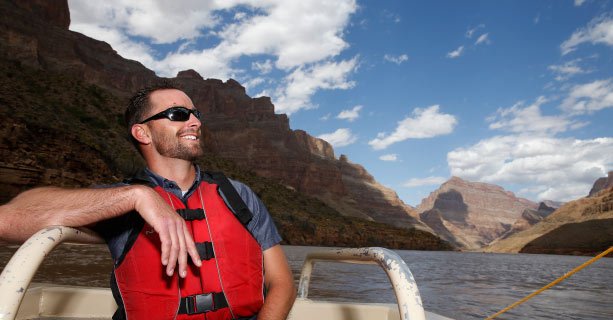 Passenger aboard a pontoon boat on the Colorado River.